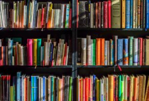 books in black wooden book shelf